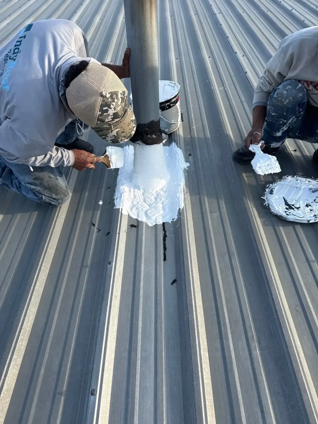 Tarping and dry-in on a Converse commercial roof